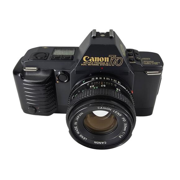 CANON T70 35MM SLR FILM CAMERA W/ FD 50MM F/1.8 LENS VINTAGE JAPAN - Picture 1 of 15